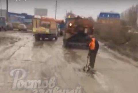 В Ростове дорожники вновь укладывали асфальт в грязь и лужи